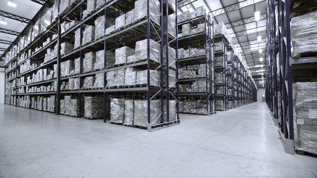 Racking bays of palletised stock in a UK distribution warehouse